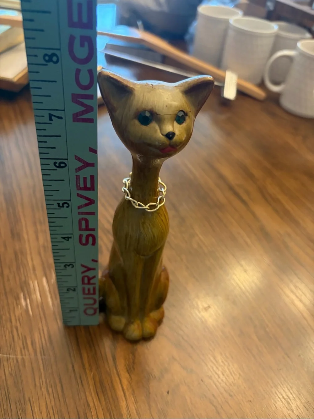 Vintage Decorative Cat Figurine w green gem eyes and necklace. Wood.